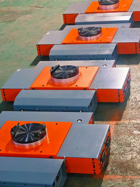 Heavy Duty 20 Ton Electric Machinery Mover With Built-In Jack For Simultaneous Lifting And Moving, Industrial Grade Remote Control Dolly Cart For Big Loads on a warehouse floor.