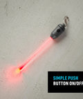 Side view of Nite Ize Radiant rechargeable LED glow stick with gray cap and S-Biner, red glow
