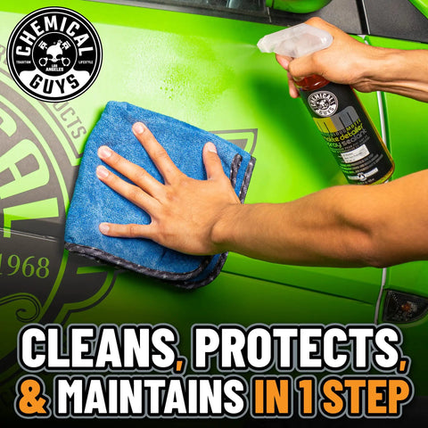 Cleaning car surface with Meticulous Matte Detailer And Spray Sealant, 32 fl oz bottle, blue microfiber cloth.