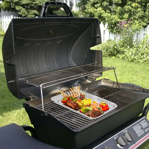 25 Pack Disposable Aluminum Grill Pans For Outdoor Cooking And Camping Large 16 By 12 Inch Aluminum Trays With Holes on a barbecue