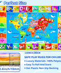 Interactive World Map Kids Rug for Playroom and Classroom 110 By 78.7 Inches Educational Geography Carpet With Continents Oceans Landmarks Animals Cultures Kid Friendly Fluffy Polyester Non Slip Preschool Mat for Nursery and Primary School featuring colorful continents, oceans, and animals with alphabet border.