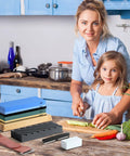 Four Sided Whetstone Knife Sharpener Set With 400 1000 And 3000 8000 Grits on kitchen counter with mother and daughter cooking