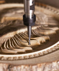 SpeTool 5pc down-cut spiral router bit set; carbide bits, 1/4 in shank, 1/8 in diameter, cutting wood, close-up