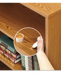 Restor It Quick 20 Fix A Chip Repair Kit With Seven Intermixable Colors used on wooden bookshelf surface with applicator and cup