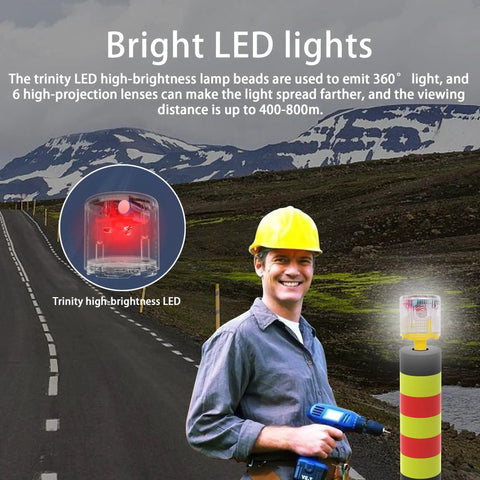 Worker holding drill near solar powered 360 degree strobe warning light with auto on off for construction sites docks marine.