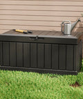 82 Gallon Resin Outdoor Storage Box All Weather Deck Box For Patio Furniture Toys Garden Tools Lockable Black Weatherproof Outdoor Storage Solution Keeps Your Yard Clean And Chill on grass.