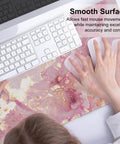 Big Ol Pink Desk Pad, 31.5 By 15.7 Inch, Rose Gold Marble, PU Leather, Waterproof Mouse Pad in use with keyboard and mouse