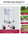 60 Quart Rolling Ice Chest Cooler Cart For Patio And Party with wheels and brakes, shown on grass, gravel, and deck surfaces.