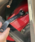 3 Piece 11mm Offset Brake Bleeder Wrench Set For Audi BMW VW Caliper Mounted Electromechanical Parking Brake Compatible No Wheel Removal Easy To Use Great For DIYers, shown being used on a red vehicle brake caliper