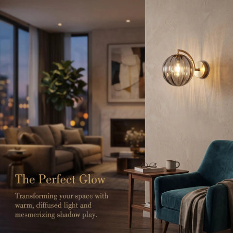 Mid‑Century Modern Globe Glass Wall Sconce with Wine Red Hand‑Blown Glass illuminating a cozy living space.