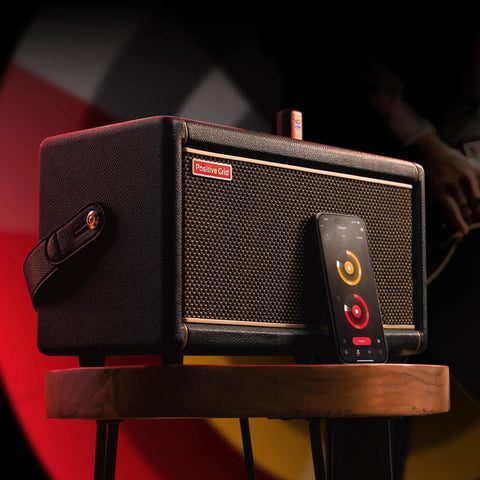 Spark 2 Dope Game Changing 50W Smart Guitar Practice Amp With Bluetooth Speaker Built In Looper AI Features And Smart App on wooden stool.