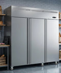 Heavy Duty Stainless Steel Three Door Commercial Freezer 54 Cubic Foot Reach In Upright Unit with visible bakery items nearby.