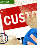 Custom Biz Sign 7x10 Inches Aluminum Sign For Indoor Outdoor Rust Free Fade Resistant 0.040 Aluminum Thickness With Pre Drilled Holes 3M EGP Reflective For Maximum Visibility Made In USA dust proof sign being wiped with blue cloth