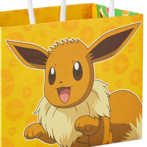 Pokemon Mini Gift Bags 18 Pack With Handles For Birthday Parties And Classroom Treats Featuring Pikachu Charizard Eevee And Gengar Designs About 5 Inches Wide By 4 Inches High By 3 Inches Deep showcasing Eevee design on yellow background with handles
