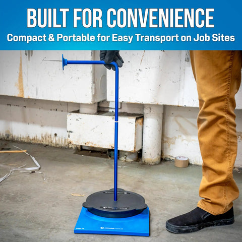 Man using Beefy Heavy Duty 10 Inch Cable Reel Dispenser Stand With Non Slip Feet Portable Drum Holder in workshop