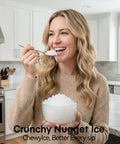 Person enjoying nugget ice from Countertop Nugget Ice Maker Portable Auto Clean With Basket And Scoop Ready In 6 Minutes