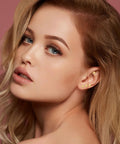 Hypoallergenic Titanium Flat Back Ball Stud Earrings For Sensitive Ears Gold Tone 5mm Ball Size, Nickel Free And Implant Grade, Simple Classic Style For Earlobes And Cartilage, Everyday Wear Jewelry worn in ear close-up