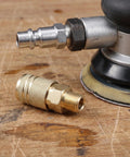 Heavy Duty Quarter Inch NPT Quick Connect Coupler Set For Air Compressors 12 Piece Industrial Pneumatic Fittings Kit With Cast Steel Self Sealing Joints Smooth Gas Flow Male End Pro Grade Spray, close-up of couplers
