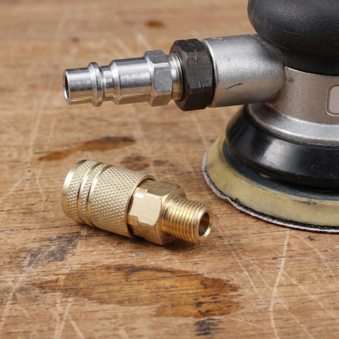 Heavy Duty Quarter Inch NPT Quick Connect Coupler Set For Air Compressors 12 Piece Industrial Pneumatic Fittings Kit With Cast Steel Self Sealing Joints Smooth Gas Flow Male End Pro Grade Spray, close-up of couplers