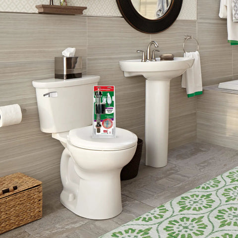 Mansfield Toilet Fill Valve And Flush Valve Seal Repair Kit For Quick Leak Fix On Mansfield 210 And 211 Toilets No Fuss Install placed on a toilet in a bathroom setting.