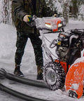 150 Ft 12 Gauge Heavy Duty Black Extension Cord With 3 Outlets powering snowblower in snowy yard