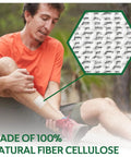 Hella Fast Halting Bleeding Gauze Wound Dressing Pads Designed To Seal Cuts Swiftly For Minor Scrapes And Stubborn Nosebleeds. Man applying gauze pads on leg outdoors.