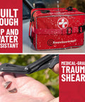 Surviveware first aid kit, red, with black medical-grade trauma shears; water-resistant.