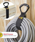 Heavy-Duty 28 Inch Storage Straps Set 2-Pack No-Fuss Hook And Loop Cord Carrier Hanger holding coiled metal hose