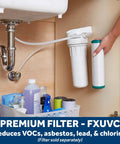 Under-sink installation of Whole Home Water Filtration System with FXUVC, showing a single-stage filter holder and a detached filter cartridge.