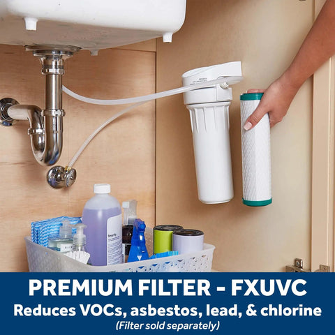 Under-sink installation of Whole Home Water Filtration System with FXUVC, showing a single-stage filter holder and a detached filter cartridge.