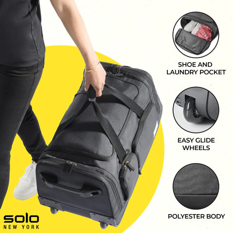 49L rolling travel duffle bag with easy-glide wheels, shoe and laundry pocket, and polyester body in use by a traveler.