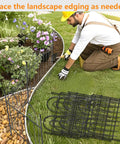 Man installing Super Sturdy No Dig Animal Barrier Fence Panels For Dogs And Rabbits 45 Feet Long With 32 Rustproof Metal Arched Sections