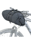 FrontLoader 8L Waterproof Handlebar Bag For Bikepacking And Camping mounted on a bicycle with quick release straps and external gear strap.