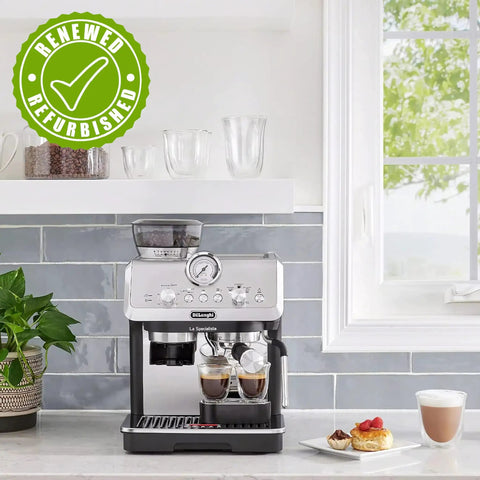 La Specialista Arte Espresso Machine Conical Burr Grinder Eight Grind Settings on kitchen counter with cups and pastries.