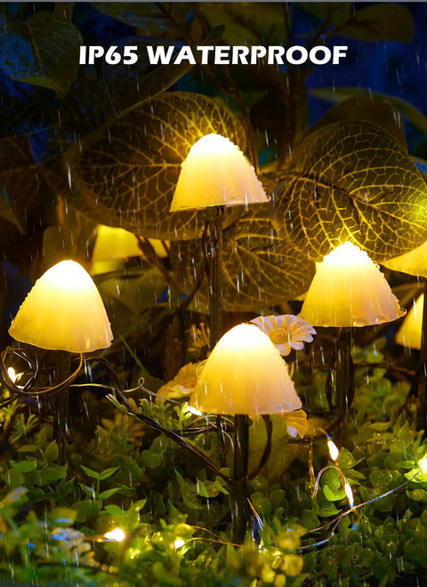 Sun Powered Mushroom String Lights, 20 LED over 32.8 feet, glowing in rain on garden pathway with IP65 waterproof rating