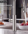 FORIOUS Kitchen Faucet with Pull Down Sprayer, High Arc, Brushed Nickel pouring water over grapes in kitchen.
