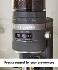 Premium Burr Coffee Grinder With Smart Dosing Technology For Dead Simple French Press To Espresso Ground Settings In Smooth Charcoal Grey Design with control display.