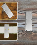 4 Pack Stainless Steel Mending Bracket Plates For Furniture Joints And Shelf Support on wood background