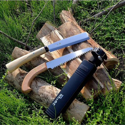 Japanese NATA Tool Knife And Pruning Saw Set 6.5 Inch Hatchet Axe displayed with sheath on wood logs outdoors