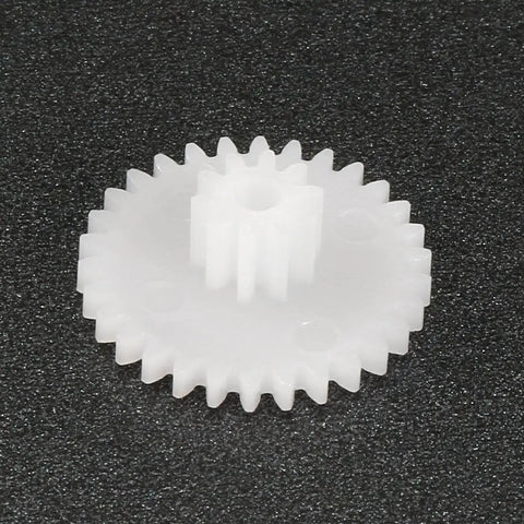 Plastic Gear Set For RC Car And Robot Motors 30 Teeth Model 30102B Worm Reduction Gear close-up on black background.