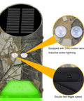 Heavy Hitter Solar Game Feeder Lights with vibrant green motion detection, showing two sensors and camouflage design.