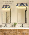 4 Light Bathroom Vanity Light Fixture With Hammered Metal Shade Finish In Dark Blue over double mirrors in modern farmhouse bathroom.
