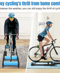 Whisper Quiet Cycling Trainer Platform with Anti Slip Foldable Aluminum Roller in use with racing bike indoors