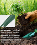 Gardener planting with Workhorse 5 In 1 Garden Trowel Weeder Tool with soft handle, forked tip, serrated blade, flat scraper, measuring scale.
