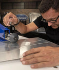 Killer Metal Fabrication Bead Roller Knobs For Motorized Units used on steel sheet; ergonomic grip enhances precise feeding.