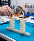 Plastic Coil Wire Winding Mold for Mini Motors and Micro Motors Six Layer Electrical Winding Frame for Precise Coil Placement Pro Grade Rewinding Tools for Micro Motor Repair Wide Applications 10.2 by 5.7 by 2.4 Inches 0.4 kW on repair bench