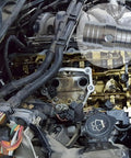 Engine bay with 1-1/4 Inch Radiator Hose Barb Coupler with 1/8 Inch NPT Steam Port, LS swap cooling system integration