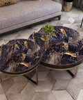 Luxurious round coffee tables with black marble pattern, enhancing living room decor with elegant style.