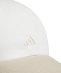 Close-up of Womens Saturday Hat With Relaxed Fit Strapback Baseball Cap Featuring Climacool Breathable Fabric in off white.