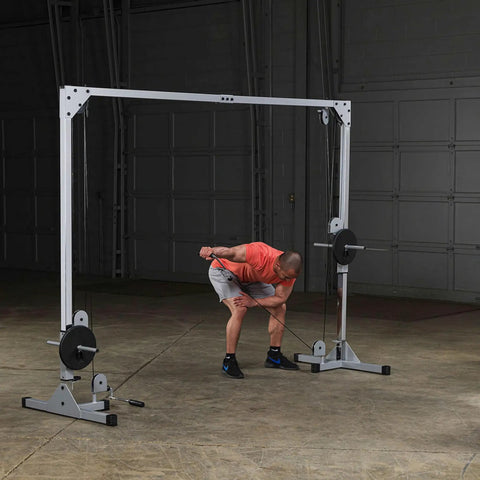 Beefy Heavy Duty Cable Crossover Machine For Home Gym Functional Trainer featuring a user pulling cables for total body workout.